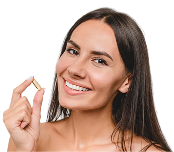 Smiling woman holding a peptide supplement capsule, promoting Mots-c therapy for improved metabolism.