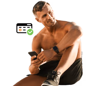 Man sitting and using a smartphone, symbolizing online health assessment for peptide therapy.